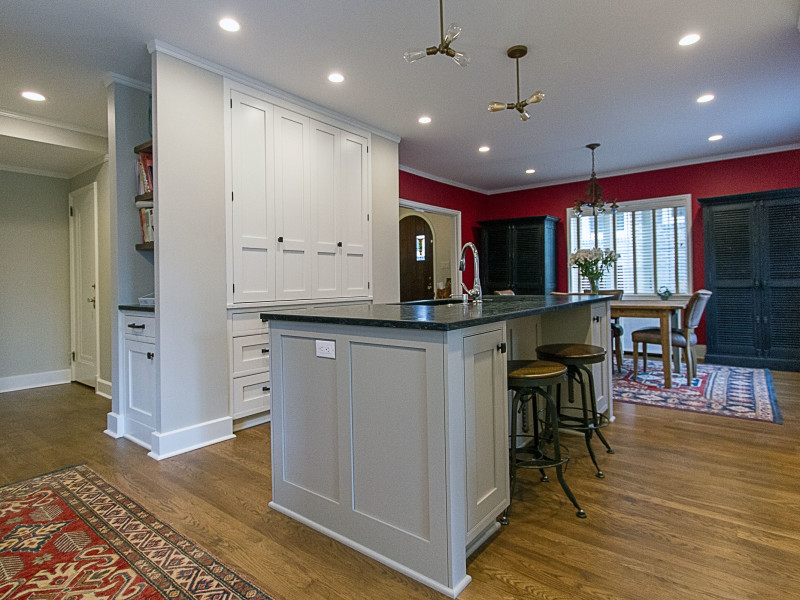 kitchen-white-cabinets-wood-floor-soapstone