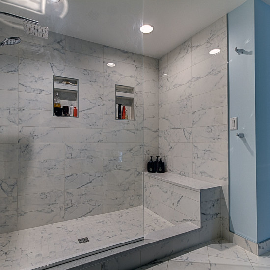 white tile-marble look tile-shower niche-shower glass