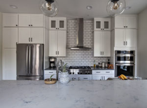 kitchen remodel- quartz countertops-white cabinets-subway tile