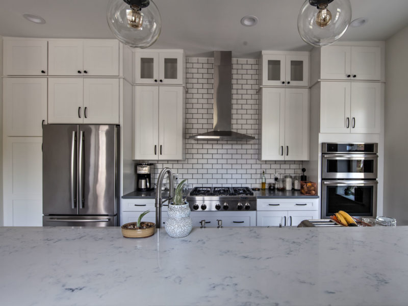 kitchen remodel- quartz countertops-white cabinets-subway tile