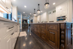 Photo of a beautifully remodeled kitchen with a large island.