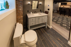 Beautifully remodeled bathroom in a finished basement in Pittsburgh.