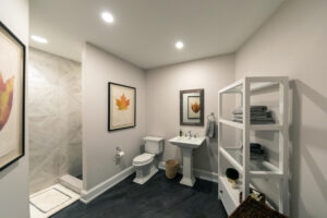 Photo of the bathroom in a large, beautifully finished basement in Pittsburgh.