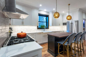 View of the black window above the sink in a newly remodeled kitchen.