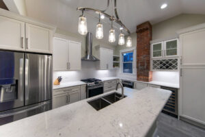 Overhead view of the large marble island in a newly remodeled kitchen.