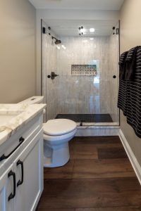 View of the bathroom in a remodeled basement in Pittsburgh.