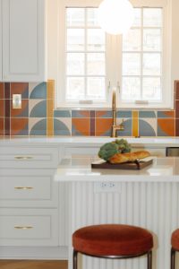 Close up view of the island and sink in a kitchen that was part of a first floor renovation in Pittsburgh.