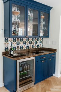 View of the blue custom built wet bar that was part of a first floor renovation in Pittsburgh.