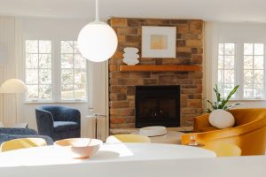 View of the sitting room with bold furniture in a newly remodeled home in Pittsburgh.